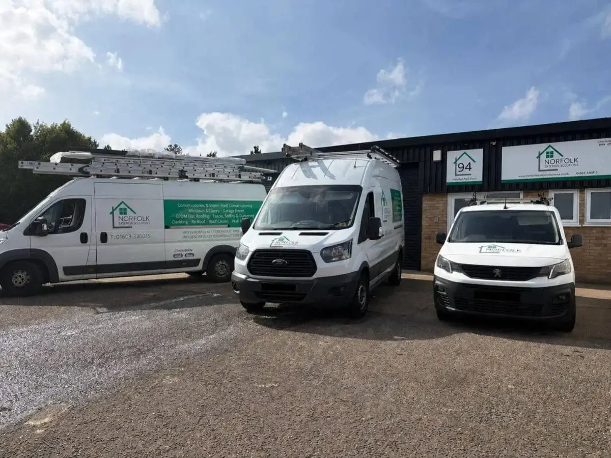Norfolk Exterior Solutions company vans parked at their Unit 94 headquarters, ready for window and door installation projects across Norfolk